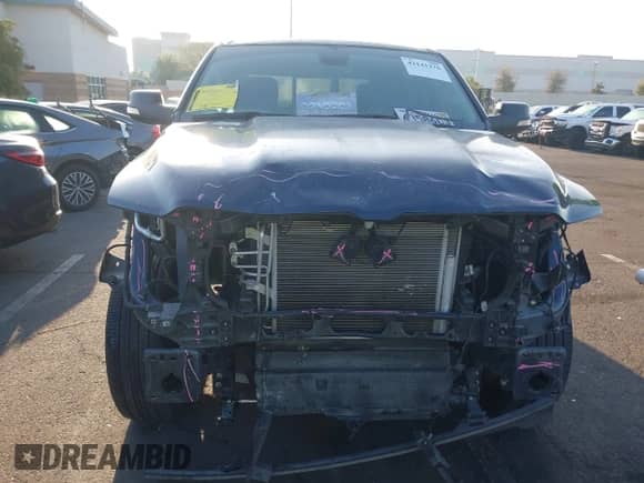 2020 Ram 1500 Big Horn z VIN 1C6RREFT7LN401927, wystawiony jako IAAI lot #42141276 z przebiegiem 52 221 mil mil oraz . Historia ofert i sprzedaży dostępna na DreamBid. Obrazek 6.