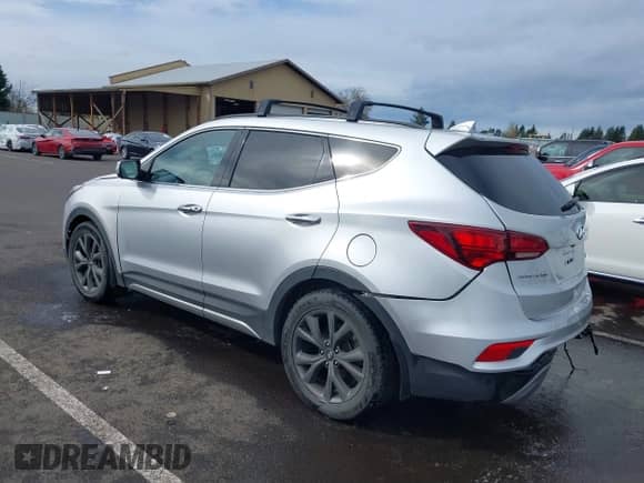 2018 Hyundai Santa Fe Ultimate with VIN 5XYZWDLA7JG542869, listed as a IAAI auction lot 41889520 with 51,294 mi miles and . Bid and sale history available at DreamBid. Image 3.