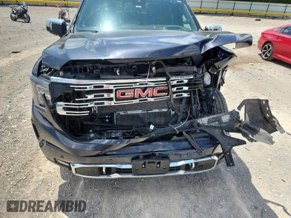 2023 GMC Sierra 1500 Denali with VIN 1GTUUGE88PZ274498, listed as a Copart auction lot 64927885 with 28,326 mi miles and Salvage title. Bid and sale history available at DreamBid. Image 11.