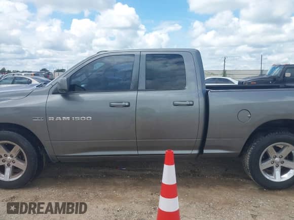 2011 Ram 1500 Big Horn with VIN 1D7RB1GT8BS680010, listed as a IAAI auction lot 42966741 with 218,858 mi miles and . Bid and sale history available at DreamBid. Image 14.