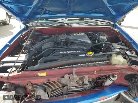 2004 Toyota Tacoma PreRunner with VIN 5TESN92N54Z340774, listed as a Copart auction lot 82484455 with 147,005 mi miles and Salvage title. Bid and sale history available at DreamBid. Image 11.