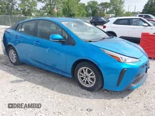 2021 Toyota Prius L Eco with VIN JTDKAMFUXM3141945, listed as a IAAI auction lot 43016798 with 230,906 mi miles and . Bid and sale history available at DreamBid. Image 1.