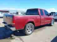 1999 Ford F-150 with VIN 1FTRX17W3XKB03527, listed as a IAAI auction lot 43450405 with 121,752 mi miles and . Bid and sale history available at DreamBid. Image 4.