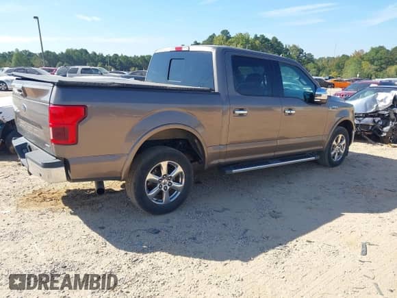 2020 Ford F-150 XLT z VIN 1FTEW1CP7LFA08701, wystawiony jako IAAI lot #43251685 z przebiegiem 94 333 mil mil oraz . Historia ofert i sprzedaży dostępna na DreamBid. Obrazek 4.