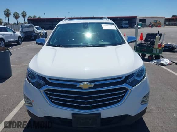 2020 Chevrolet Equinox Premier with VIN 2GNAXNEV2L6140216, listed as a IAAI auction lot 43035322 with 103,313 mi miles and . Bid and sale history available at DreamBid. Image 12.