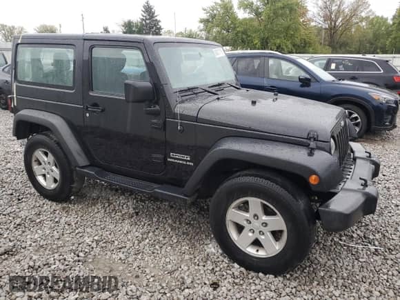 2011 Jeep Wrangler Sport с VIN 1J4AA2D1XBL548549, выставлен на аукционе Copart как лот 84217115 с пробегом 127 704 миль миль и Списание • Salvage title. История ставок и продаж доступна на DreamBid. Изображение 4.