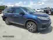 2022 Honda Pilot Touring 7-Passenger with VIN 5FNYF5H64NB017528, listed as a Copart auction lot 65406285 with 64,652 mi miles and Salvage title. Bid and sale history available at DreamBid. Image 4.