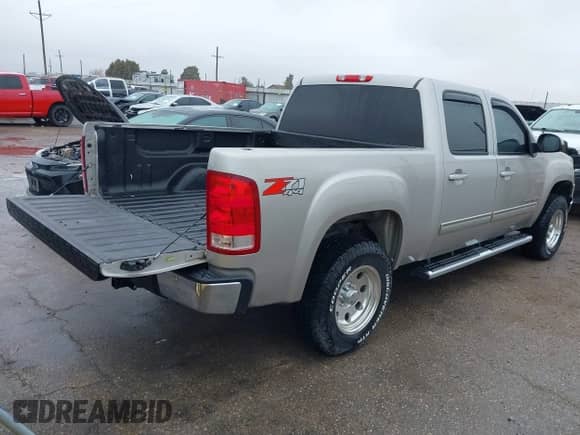 2008 GMC Sierra 1500 Work Truck with VIN 2GTEK13M881169431, listed as a IAAI auction lot 41435930 with 132,787 mi miles and . Bid and sale history available at DreamBid. Image 4.