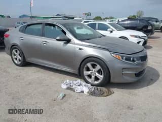 2016 Kia Optima EX with VIN 5XXGU4L34GG059142, listed as a IAAI auction lot 43519874 with 141,445 mi miles and . Bid and sale history available at DreamBid. Image 1.