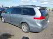 2012 Toyota Sienna XLE with VIN 5TDYK3DCXCS235154, listed as a IAAI auction lot 43366877 with 216,434 mi miles and . Bid and sale history available at DreamBid. Image 3.