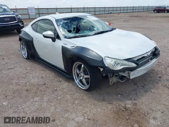 2016 Scion FR-S z VIN JF1ZNAA1XG9707527, wystawiony jako IAAI lot #42446688 z przebiegiem 82 531 mil mil oraz . Historia ofert i sprzedaży dostępna na DreamBid. Obrazek 1.
