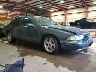 1995 Chevrolet Caprice z VIN 1G1BL52P6SR144277, wystawiony jako Copart lot #72798924 z przebiegiem Nie podano mil oraz Szkoda całkowita • Salvage title. Historia ofert i sprzedaży dostępna na DreamBid. Obrazek 4.