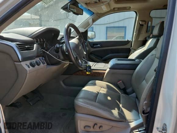 2015 Chevrolet Suburban LTZ с VIN 1GNSKKKC4FR159394, выставлен на аукционе Copart как лот 80282745 с пробегом 165 634 миль миль и Списание • Salvage title. История ставок и продаж доступна на DreamBid. Изображение 7.