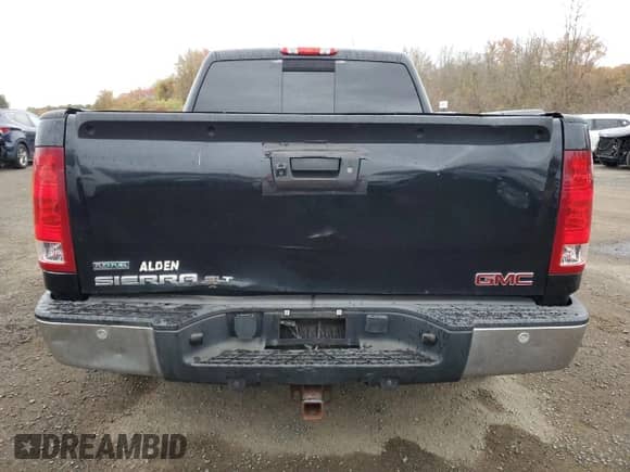 2011 GMC Sierra 1500 SLT with VIN 3GTP2WE38BG107228, listed as a Copart auction lot 90619085 with 233,578 mi miles and Clean title. Bid and sale history available at DreamBid. Image 6.