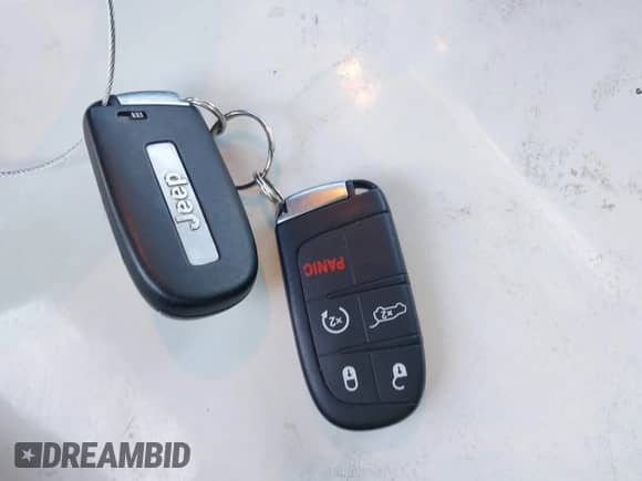 2014 Jeep Grand Cherokee Summit z VIN 1C4RJFJM2EC534132, wystawiony jako IAAI lot #42842349 z przebiegiem 96 636 mil mil oraz . Historia ofert i sprzedaży dostępna na DreamBid. Obrazek 11.