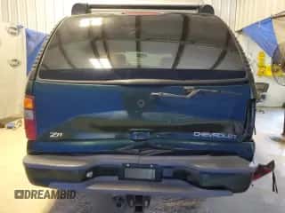 2003 Chevrolet Suburban LT z VIN 3GNFK16T63G258140, wystawiony jako Copart lot #63621564 z przebiegiem Nie podano mil oraz Szkoda całkowita • Salvage title. Historia ofert i sprzedaży dostępna na DreamBid. Obrazek 6.