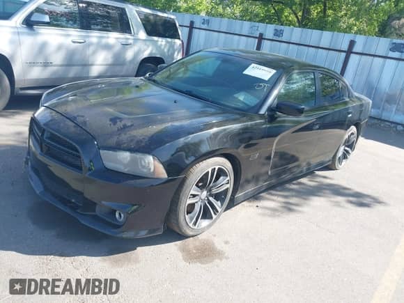 2013 Dodge Charger SRT-8 Super Bee z VIN 2C3CDXGJ4DH604178, wystawiony jako IAAI lot #42519959 z przebiegiem 175 020 mil mil oraz . Historia ofert i sprzedaży dostępna na DreamBid. Obrazek 2.