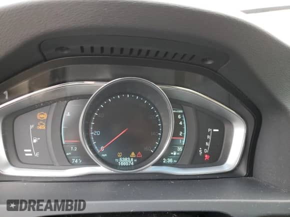 2014 Volvo S60 T5 с VIN YV1612FH4E2283668, выставлен на аукционе Copart как лот 80115725 с пробегом 166 574 миль миль и Списание • Salvage title. История ставок и продаж доступна на DreamBid. Изображение 9.