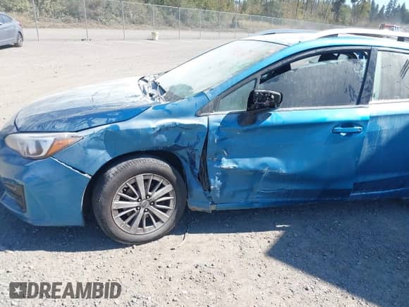 2017 Subaru Impreza Premium with VIN 4S3GTAB65H3732745, listed as a IAAI auction lot 43060760 with 141,614 mi miles and . Bid and sale history available at DreamBid. Image 6.