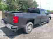 2015 Chevrolet Silverado 2500HD LT z VIN 1GC1KVE82FF572185, wystawiony jako IAAI lot #42207194 z przebiegiem 245 109 mil mil oraz . Historia ofert i sprzedaży dostępna na DreamBid. Obrazek 4.