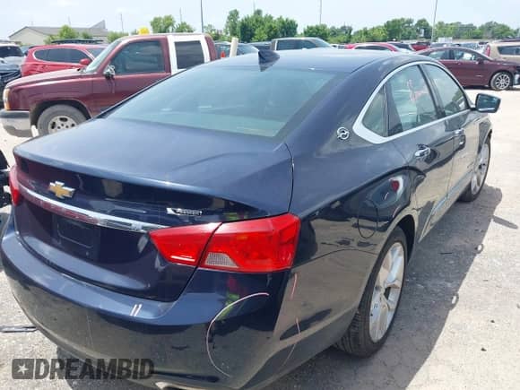 2018 Chevrolet Impala Premier with VIN 1G1125S39JU125889, listed as a IAAI auction lot 42589965 with 106,821 mi miles and . Bid and sale history available at DreamBid. Image 4.