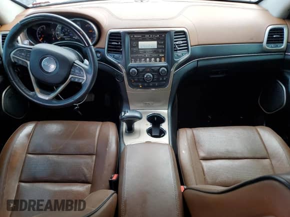 2015 Jeep Grand Cherokee Summit с VIN 1C4RJFJMXFC712547, выставлен на аукционе Copart как лот 60152615 с пробегом 72 167 миль миль и Списание • Salvage title. История ставок и продаж доступна на DreamBid. Изображение 8.