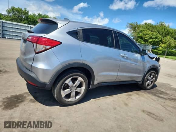 2020 Honda HR-V LX with VIN 3CZRU5H36LM705663, listed as a Copart auction lot 68916565 with 94,415 mi miles and Salvage title. Bid and sale history available at DreamBid. Image 3.
