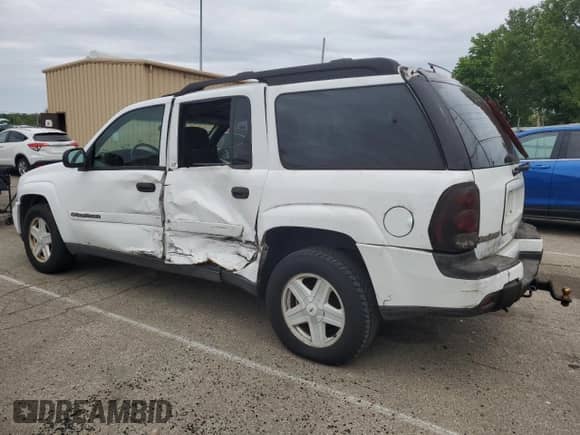 2003 Chevrolet TrailBlazer EXT LT z VIN 1GNET16S236241689, wystawiony jako Copart lot #55781825 z przebiegiem 210 651 mil mil oraz Szkoda całkowita • Salvage title. Historia ofert i sprzedaży dostępna na DreamBid. Obrazek 2.