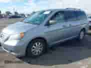 2008 Honda Odyssey EX-L with VIN 5FNRL38628B104477, listed as a IAAI auction lot 43363199 with 220,595 mi miles and . Bid and sale history available at DreamBid. Image 2.