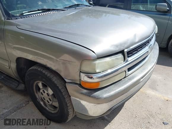 2003 Chevrolet Suburban LS z VIN 3GNEC16Z43G157689, wystawiony jako IAAI lot #42746658 z przebiegiem 291 612 mil mil oraz . Historia ofert i sprzedaży dostępna na DreamBid. Obrazek 6.