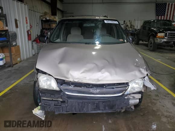 2001 Chevrolet Venture LS Y3G Mobility with VIN 1GNDX03E41D274260, listed as a Copart auction lot 54728075 with 184,488 mi miles and Salvage title. Bid and sale history available at DreamBid. Image 5.