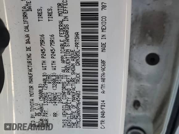 2023 Toyota Tacoma SR z VIN 3TMCZ5ANXPM645403, wystawiony jako Copart lot #84790665 z przebiegiem 81 279 mil mil oraz Szkoda całkowita • Salvage title. Historia ofert i sprzedaży dostępna na DreamBid. Obrazek 13.