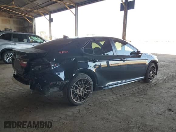 2023 Toyota Camry Hybrid SE with VIN 4T1T31AK5PU051891, listed as a Copart auction lot 85364115 with 50,045 mi miles and Salvage title. Bid and sale history available at DreamBid. Image 3.