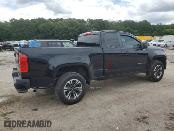 2021 Chevrolet Colorado 2WD LT с VIN 1GCHSCEAXM1260910, выставлен на аукционе Copart как лот 63559385 с пробегом 100 801 миль миль и Списание • Salvage title. История ставок и продаж доступна на DreamBid. Изображение 3.