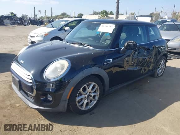 2014 MINI Hardtop with VIN WMWXM5C53ET934731, listed as a IAAI auction lot 43345367 with 48,628 mi miles and . Bid and sale history available at DreamBid. Image 17.