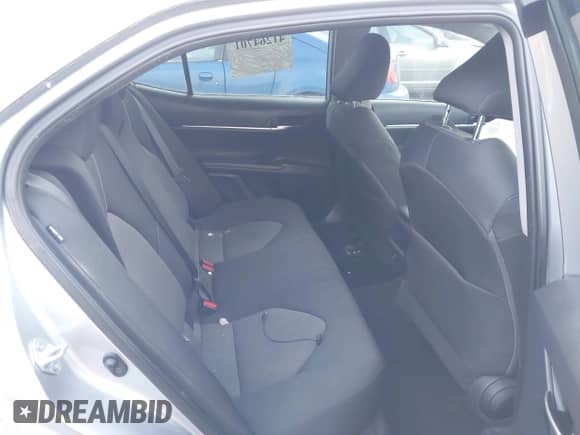 2021 Toyota Camry LE z VIN 4T1C11AK7MU545056, wystawiony jako IAAI lot #41264701 z przebiegiem 59 306 mil mil oraz . Historia ofert i sprzedaży dostępna na DreamBid. Obrazek 8.