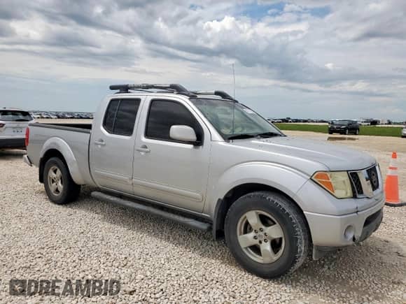 2007 Nissan Frontier SE with VIN 1N6AD09U17C433783, listed as a Copart auction lot 67717885 with 179,608 mi miles and Salvage title. Bid and sale history available at DreamBid. Image 4.