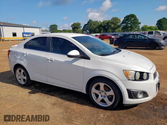 2014 Chevrolet Sonic LTZ with VIN 1G1JE5SB1E4218653, listed as a Copart auction lot 62074745 with 142,720 mi miles and Salvage title. Bid and sale history available at DreamBid. Image 4.
