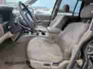 2004 Jeep Grand Cherokee Laredo with VIN 1J4GW48S84C361744, listed as a Copart auction lot 91091115 with 236,095 mi miles and Clean title. Bid and sale history available at DreamBid. Image 7.