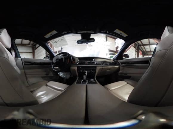 2013 BMW 7 Series 740Li xDrive with VIN WBAYF4C56DD127914, listed as a IAAI auction lot 41370207 with 138,619 mi miles and . Bid and sale history available at DreamBid. Image 22.