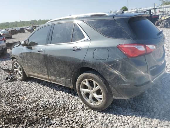 2018 Chevrolet Equinox Premier z VIN 3GNAXMEV2JS569820, wystawiony jako Copart lot #54921845 z przebiegiem Nie podano mil oraz Szkoda całkowita • Salvage title. Historia ofert i sprzedaży dostępna na DreamBid. Obrazek 2.