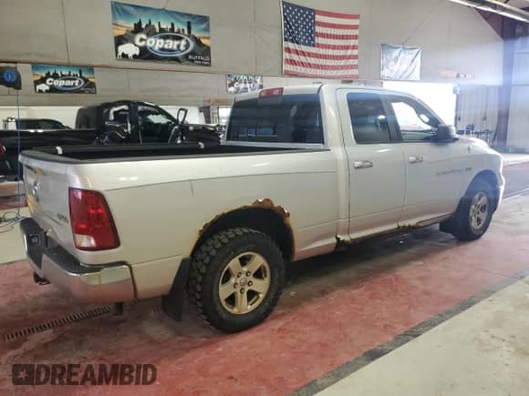 2011 Ram 1500 SLT with VIN 1D7RV1GT8BS644678, listed as a Copart auction lot 86136235 with 169,577 mi miles and Salvage title. Bid and sale history available at DreamBid. Image 3.