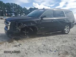 2015 Chevrolet Tahoe LT с VIN 1GNSCBKC4FR676868, выставлен на аукционе Copart как лот 68572085 с пробегом 103 364 миль миль и Списание • Salvage title. История ставок и продаж доступна на DreamBid. Изображение 1.