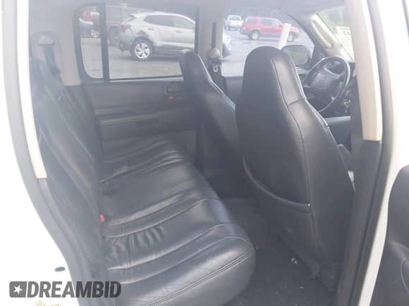 2002 Dodge Dakota SLT with VIN 1B7HG48NX2S537178, listed as a IAAI auction lot 42683642 with 165,384 mi miles and . Bid and sale history available at DreamBid. Image 8.