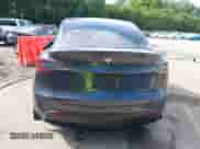 2023 Tesla Model Y Long Range z VIN 7SAYGAEE8PF880355, wystawiony jako IAAI lot #42635761 z przebiegiem 57 442 mil mil oraz . Historia ofert i sprzedaży dostępna na DreamBid. Obrazek 16.