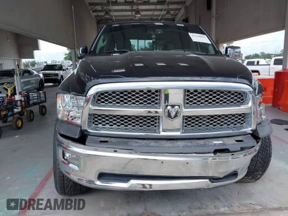 2012 Ram 1500 Laramie z VIN 1C6RD6NT2CS199165, wystawiony jako IAAI lot #43240860 z przebiegiem 174 464 mil mil oraz . Historia ofert i sprzedaży dostępna na DreamBid. Obrazek 12.