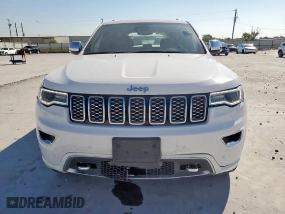 2017 Jeep Grand Cherokee Overland with VIN 1C4RJECG4HC965657, listed as a Copart auction lot 84400635 with 141,055 mi miles and Salvage title. Bid and sale history available at DreamBid. Image 5.