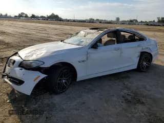 2013 BMW 5 Series 535i с VIN WBAFR7C52DC825071, выставлен на аукционе Copart как лот 82106575 с пробегом Не указан миль и Списание • Salvage title. История ставок и продаж доступна на DreamBid. Изображение 1.