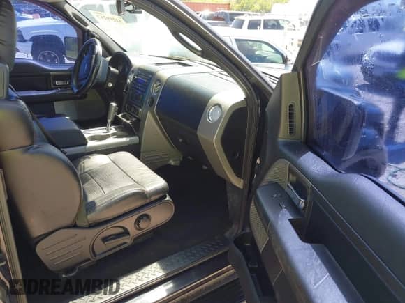 2007 Ford F-150 XL with VIN 1FTPX12V77KB62411, listed as a IAAI auction lot 42219217 with 204,775 mi miles and . Bid and sale history available at DreamBid. Image 5.