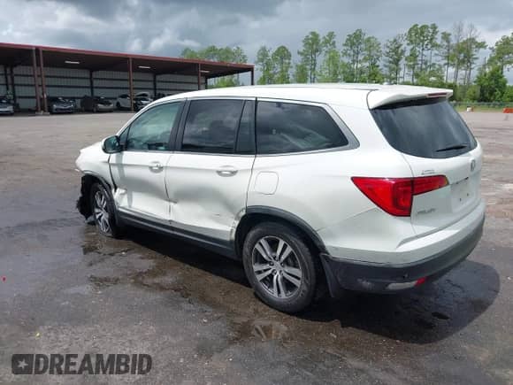 2017 Honda Pilot EX-L with VIN 5FNYF5H57HB043651, listed as a IAAI auction lot 42728498 with 122,316 mi miles and . Bid and sale history available at DreamBid. Image 3.